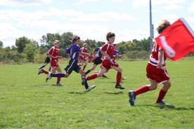 Children playing soccer